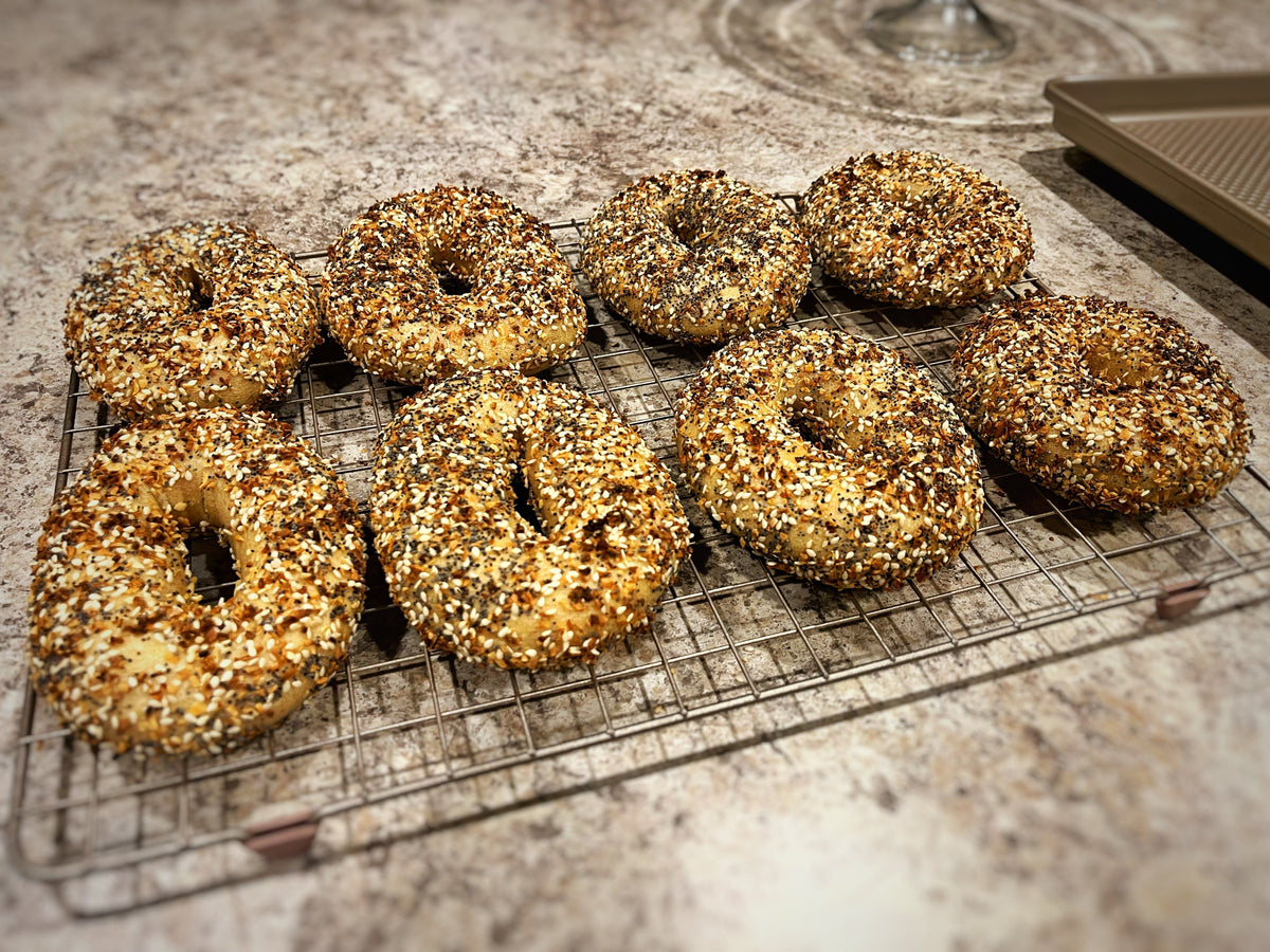 Baked everything bagels with a full seed coat on every side.