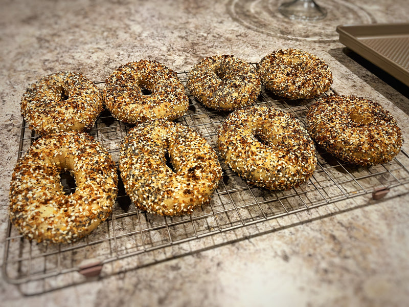Baked everything bagels with a full seed coat on every side.