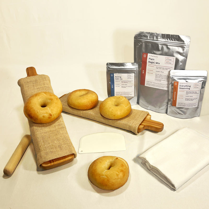 Bagel making kit with board, ingredient kits and tools.